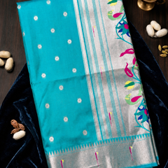 Elegant Turquoise Silk Paithani Saree | Silver Zari Work & Traditional Peacock Pallu