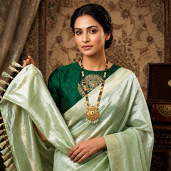 Ethereal Mint Green Tissue Silk Saree | Subtle Gold Zari & Tassel Detailing